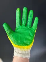 Перчатки строительные зеленые обливные